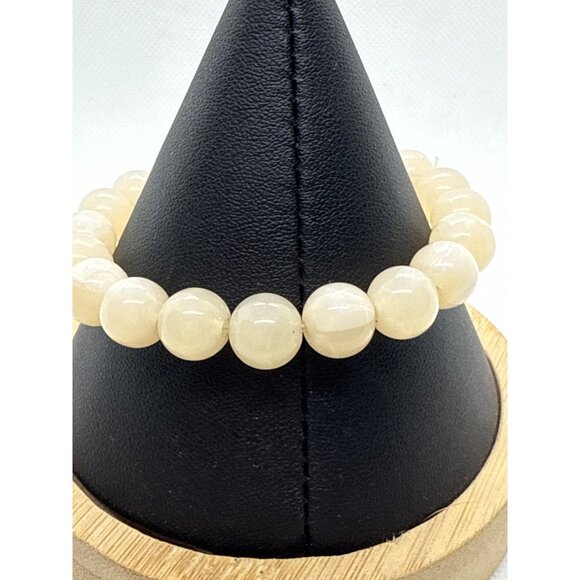 Beaded Stretch Bracelet With Gold Peace Charm - Picture 4 of 4